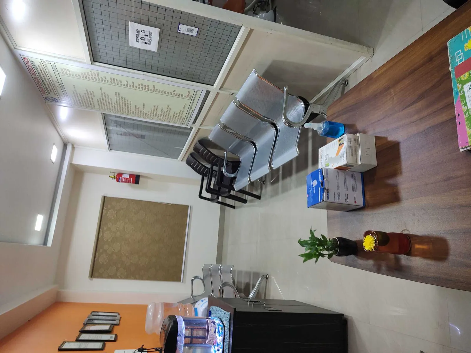 Interior view from entrance showcasing reception desk and comfortable seating lounge